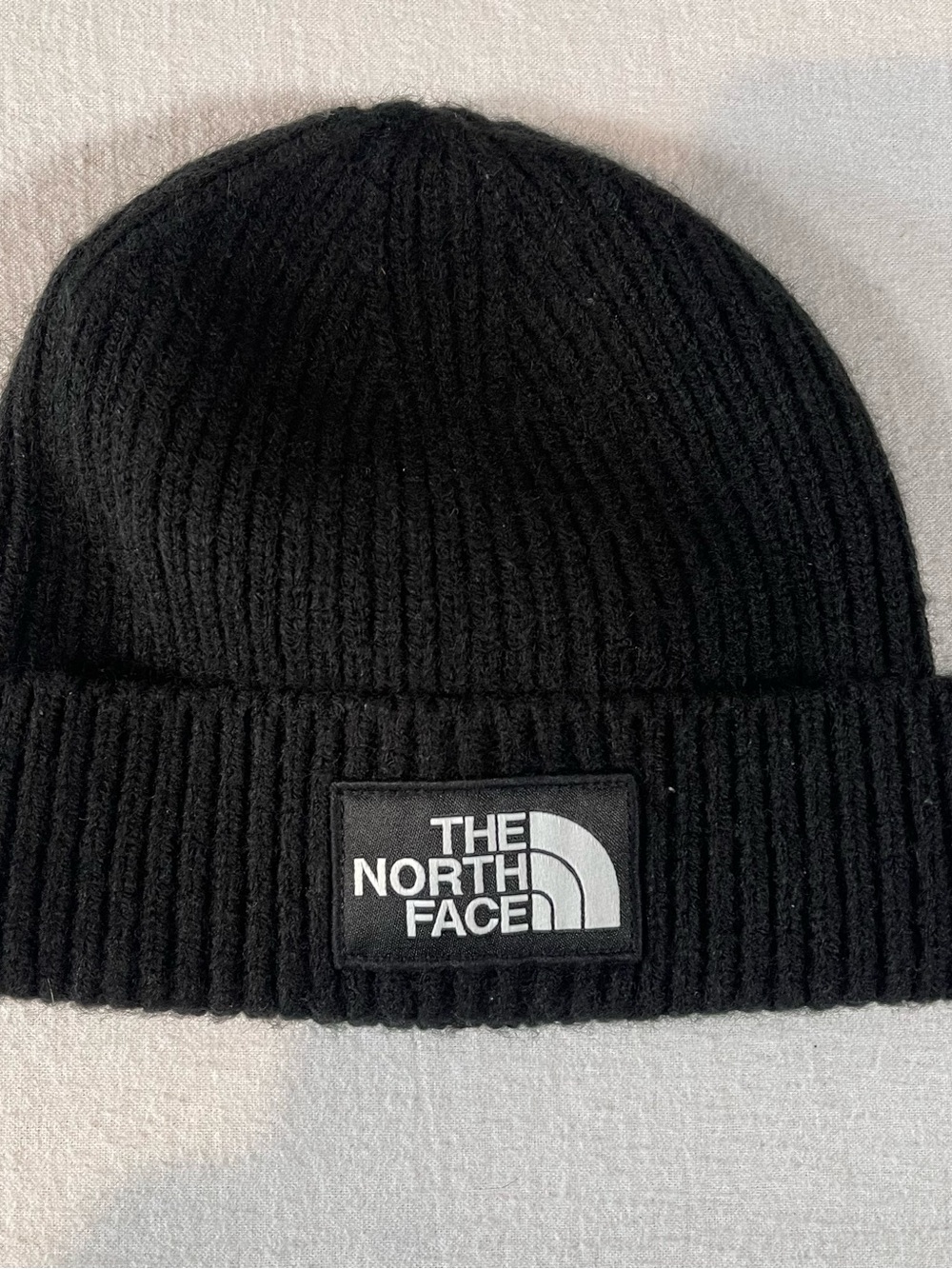 The North Face Black Ribbed Cuffed Beanie with Logo Patch